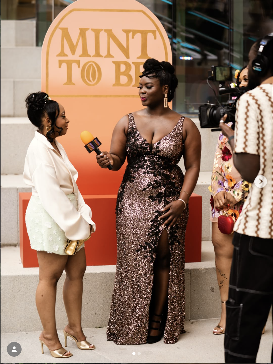 Jasmine Ballard interviewing a guest on the Mint To Be carpet in Charlotte.