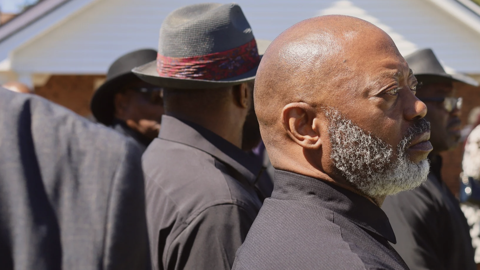 Elders gathered outdoors in a southeastern North Carolina river community.